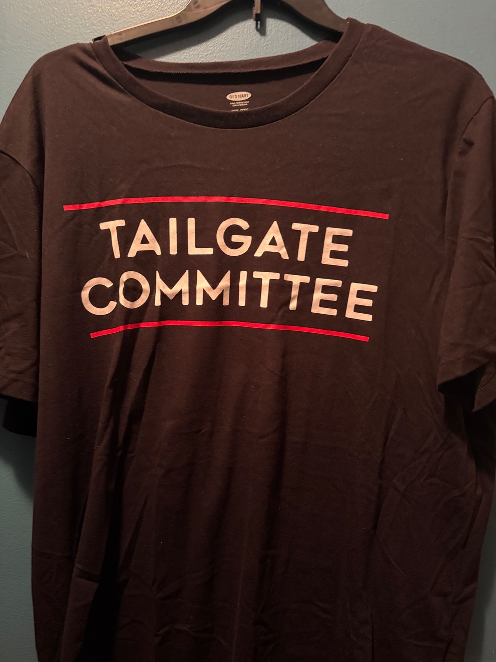 Old Navy Black Graphic Tee with White Text and Red Stripes